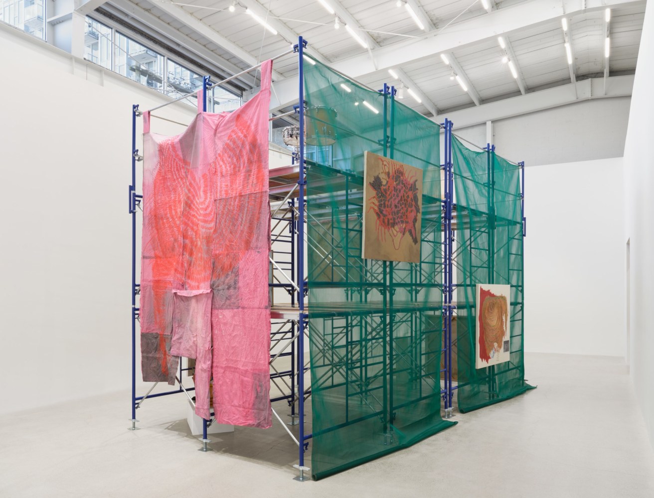 duane linklater,&amp;nbsp;teŝipit&amp;acirc;kan_cache_1, 2024, scaffolding, scrim, 7 paintings, 5 sculptures, performance