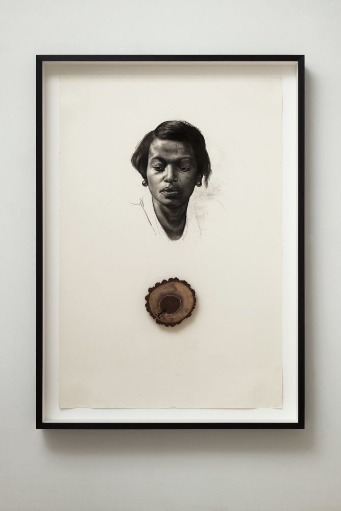 Whitfield Lovell, Spell no. 15 (Remedios), 2021. Conté on paper with attached found object, 66 1/2 x 47 3/4 x 4 3/4 inches