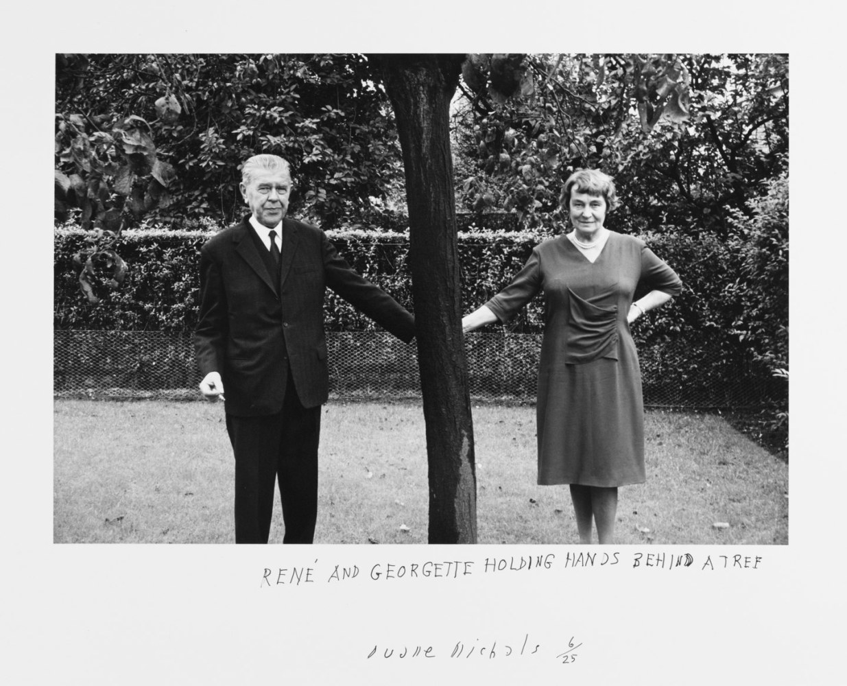 Rene and Georgette Holding Hands Behind a Tree, 1965 Gelatin silver print 6 5/8 x 9 7/8 inches (image); 11 x 14 inches (paper) Edition 6/25