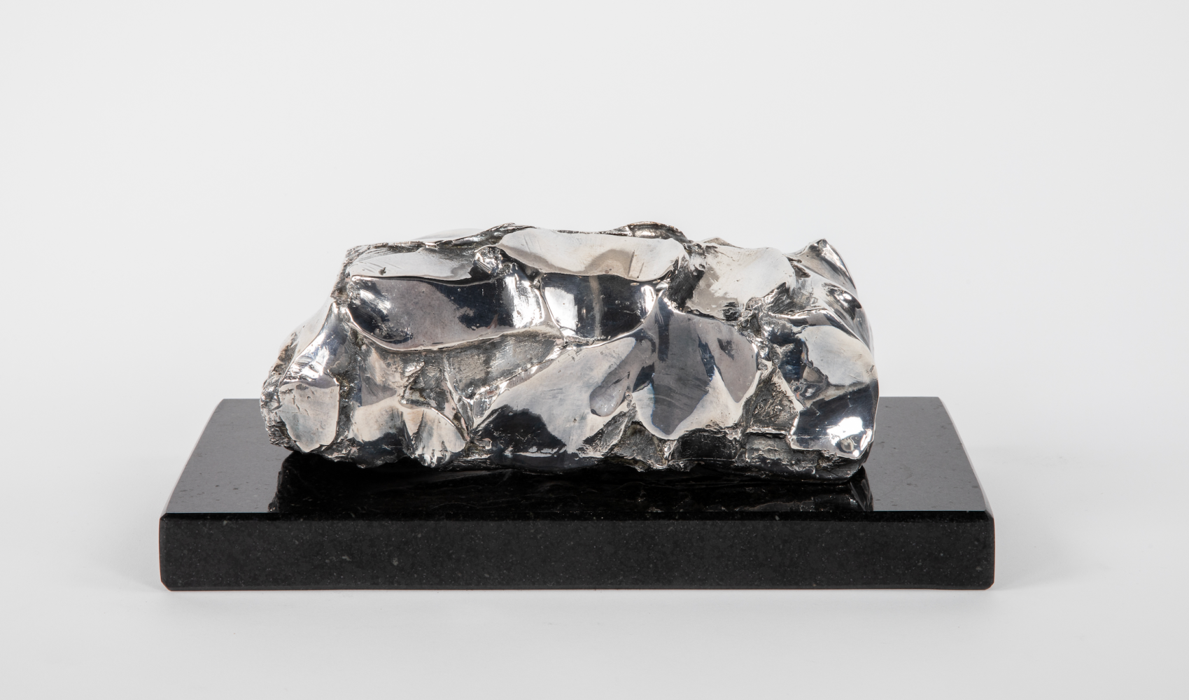 George Dunbar
Fragment Series No. 1, 1 of 7, 2010
Cast bronze, nickel plated on granite base
3h x 9w x 4d in