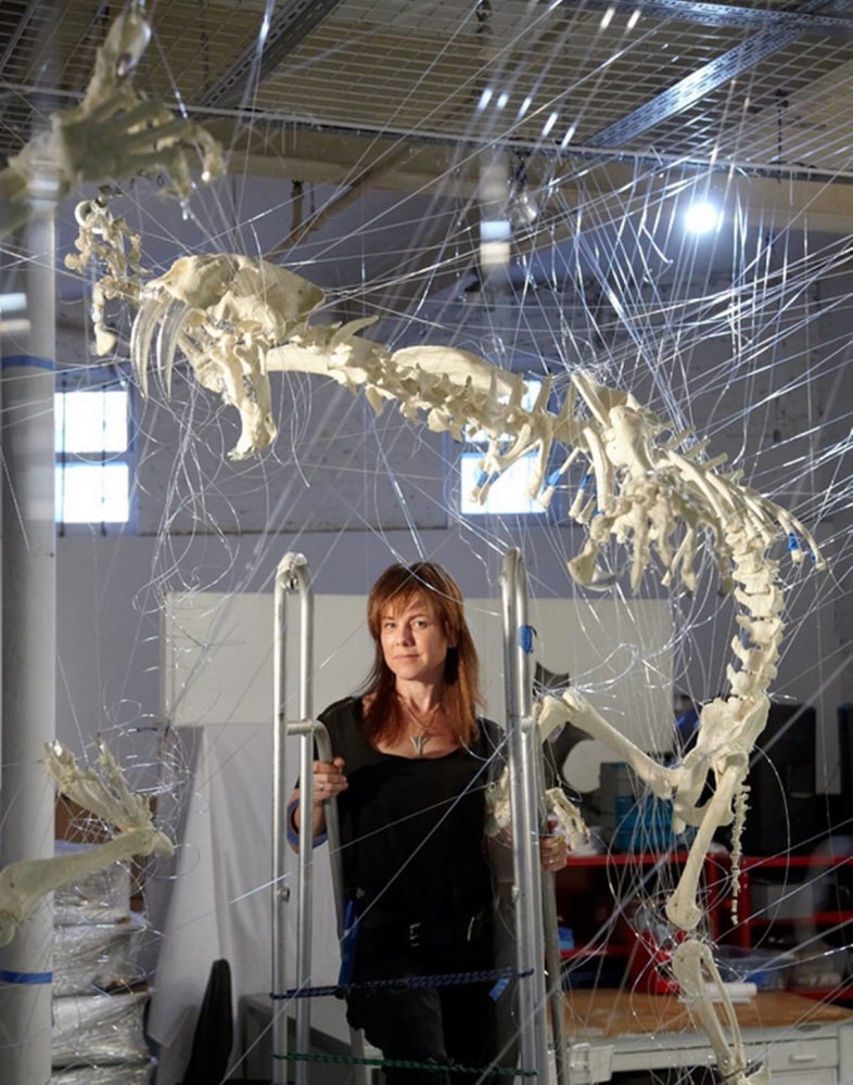 Brooklyn, New York, artist E.V. Day, with her art installation, &amp;ldquo;Cat Fight with Two Sabertoothed Skeletons.&amp;rdquo; Day also created &amp;ldquo;Daytona Vortex&amp;rdquo; out of an old Jimmie Johnson racing suit. Vincent Dilio