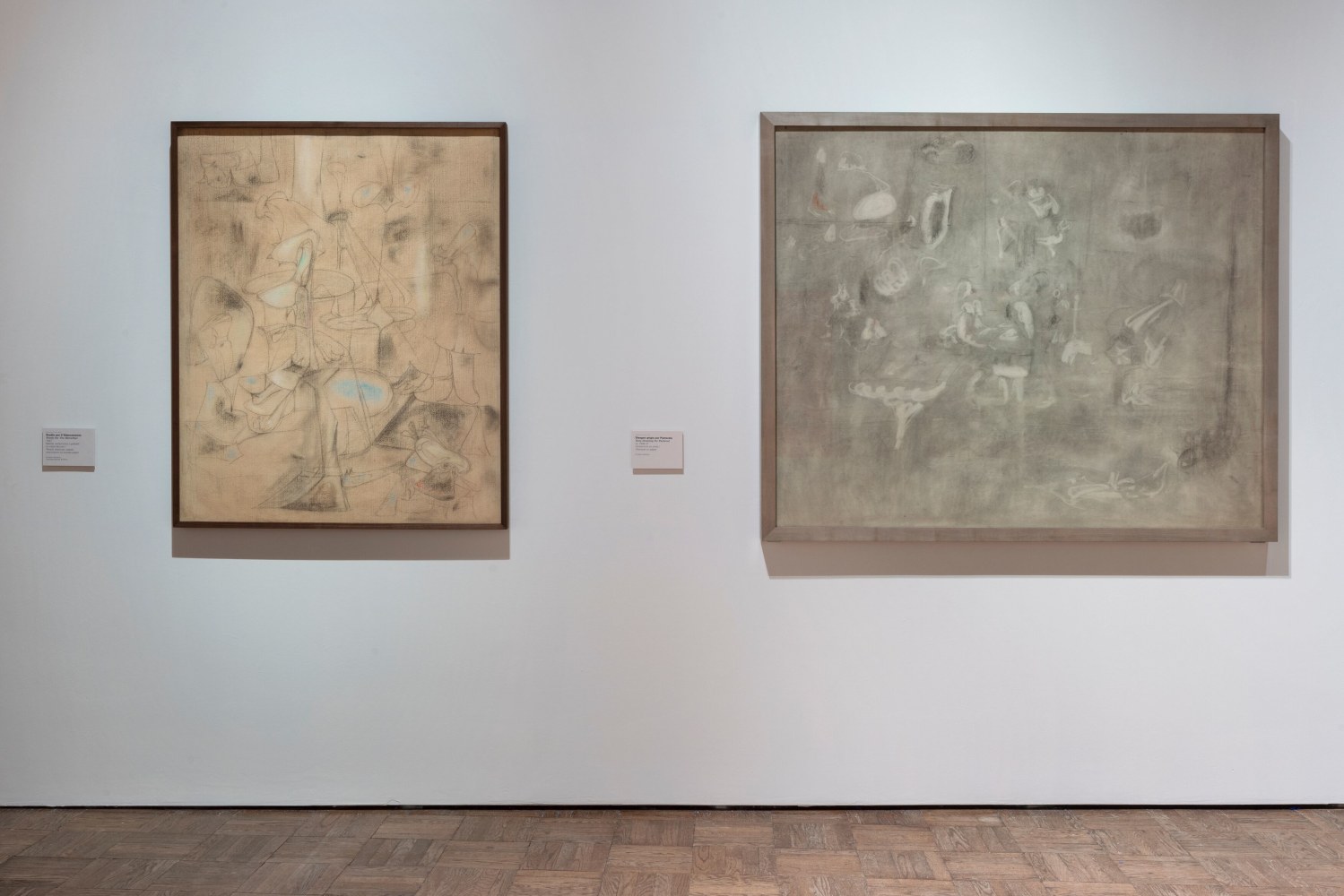 Installation photograph showing two charcoal drawings by Gorky: The Betrothal and Pastoral