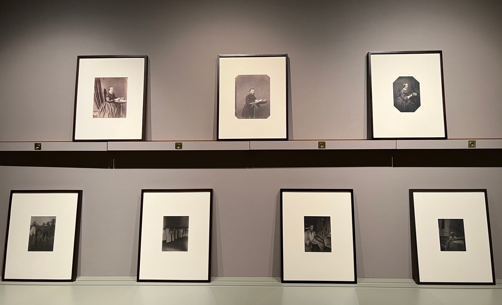 Installation view of exhibition, 3 albumen prints of portraits by Bertha Wehnert Beckman and 4 platinum prints by Doris Ulmann