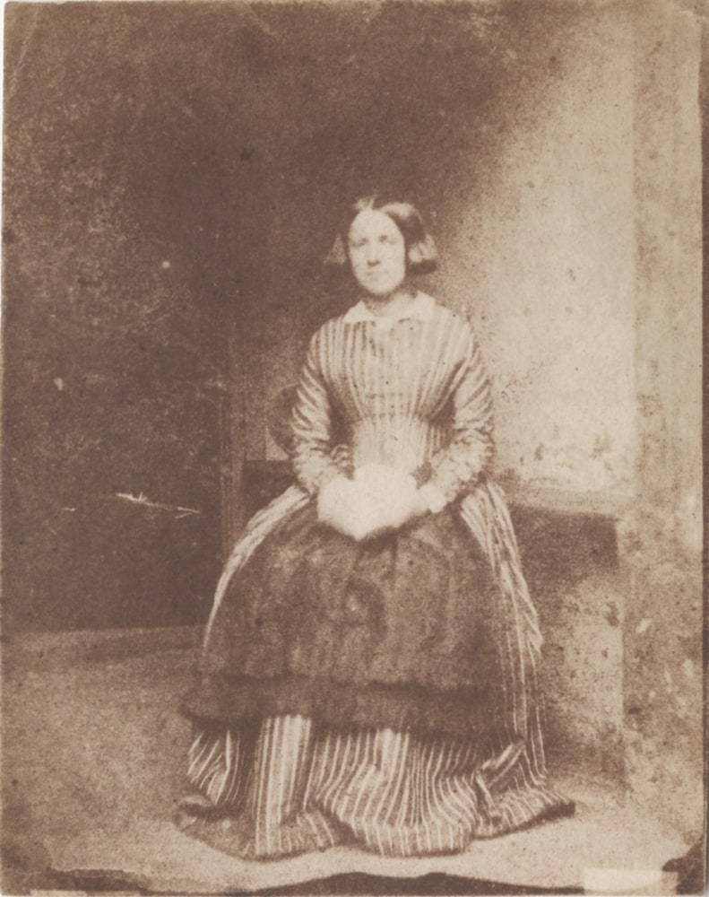 Rev. Calvert Richard JONES (Welsh, 1802-1877) Portrait of a lady, possibly a domestic servant, in a striped dress, late 1840s Salt print from a calotype negative 11.1 x 8.8 cm