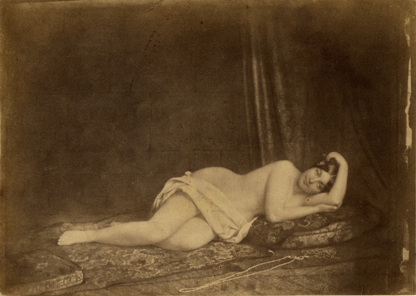 Julien VALLOU DE VILLENEUVE (French, 1795-1866) Reclining nude, 1853 Coated salt print from a paper negative 12.0 x 16.9 cm