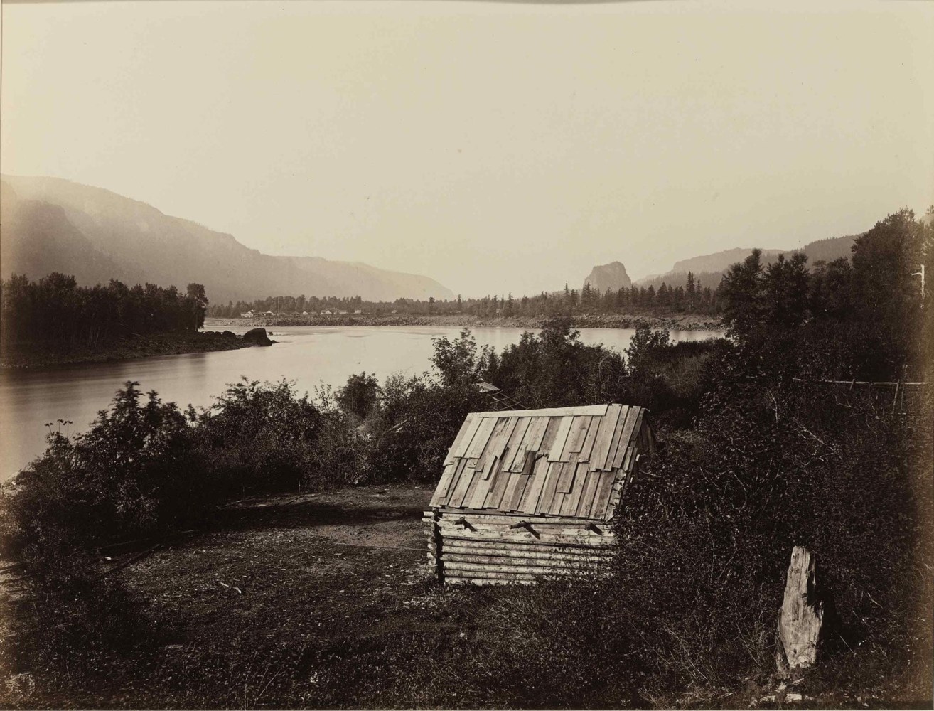 Carleton E. WATKINS (American, 1829-1916) The Garrison, Columbia River, Oregon, circa 1867 Mammoth plate albumen print 40.3 x 52.7 cm mounted on 53.0 x 67.0 cm board Titled in an unidentified contemporary calligraphic hand in ink and numbered &quot;23&quot; in an unidentified modern hand in pencil on mount. Two San Francisco Museum of Modern Art exhibition labels on verso.