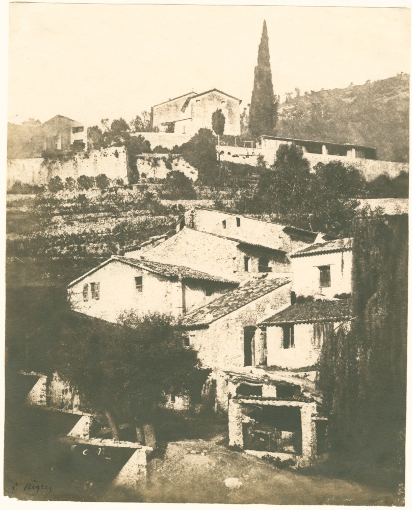 Charles NÈGRE (French, 1820-1880) Mills with cypress, Grasse*, 1852 Salt print from a waxed paper negative 19.2 x 15.6 cm Initialled in the negative and signed &quot;C. Negre&quot; in ink. Inscribed &quot;E-24&quot; and &quot;No. 89&quot; in pencil on verso.