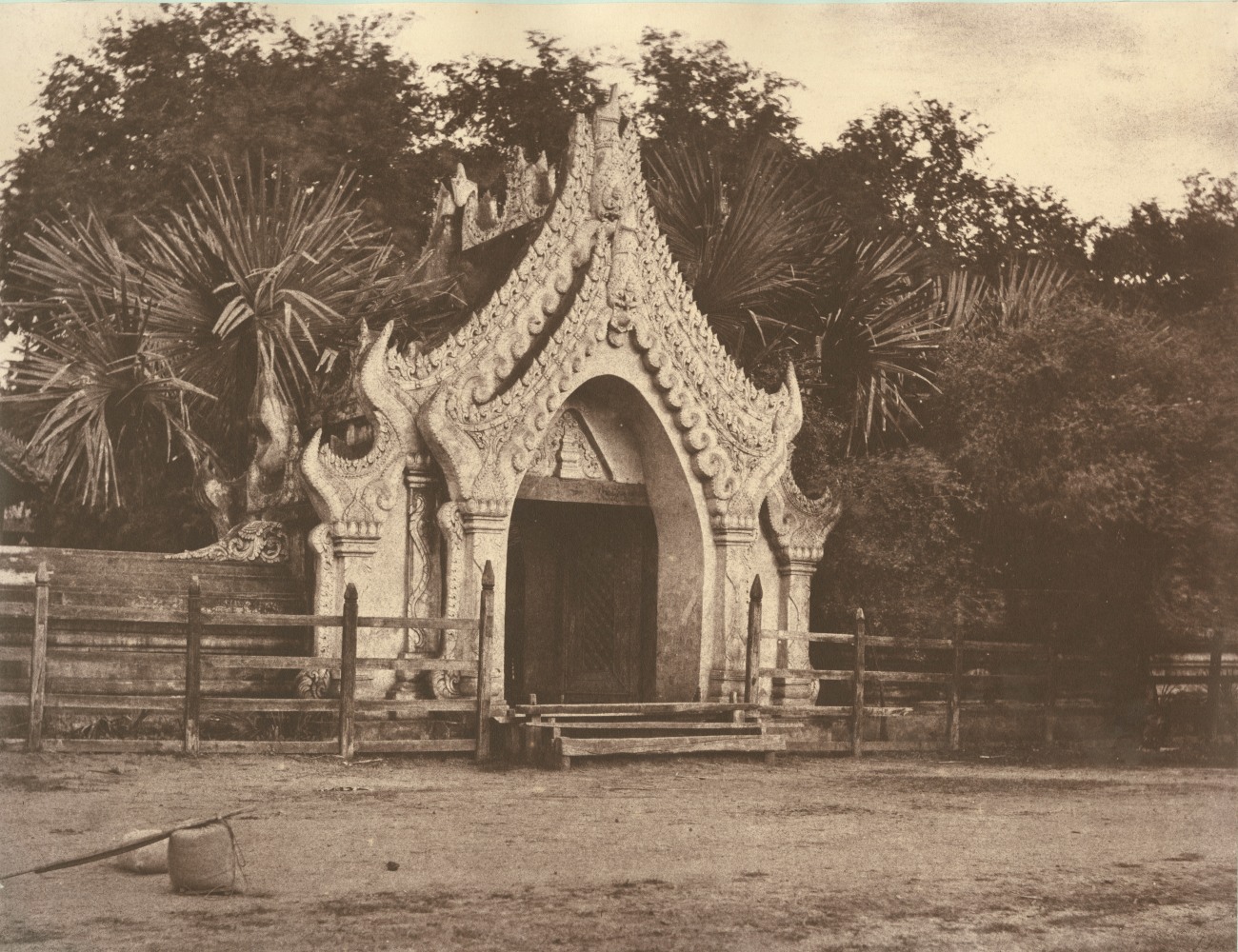 Captain Linnaeus TRIPE (English, 1822-1902) &quot;No. 60. Amerapoora. Gateway of Maja Bounghian Kyoung.&quot;, 1855 Albumenized salt print from a waxed paper negative 28.6 x 34.8 cm mounted on 45.6 x 58.3 cm paper Printed label with plate number, title and &quot;A solidly built wall usually surrounds Kyoungs; in the centre of each side of which is a gateway similar to the above.&quot; on mount