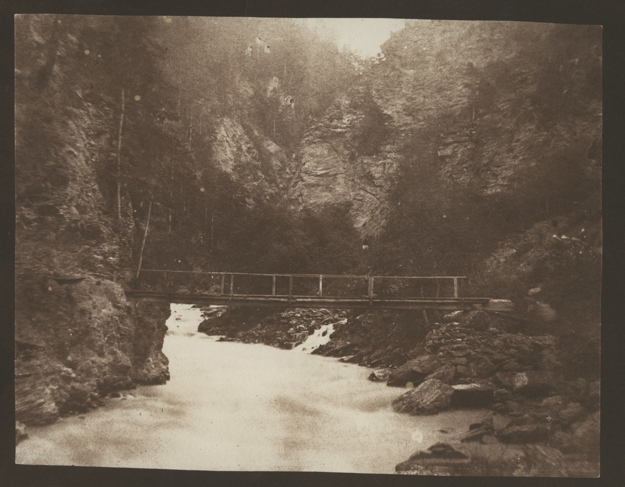 William Henry Fox TALBOT (English, 1800-1877) Rustic bridge across a gorge, probably in Scotland, circa 1844 Salt print from a calotype negative 14.1 x 18.1 cm