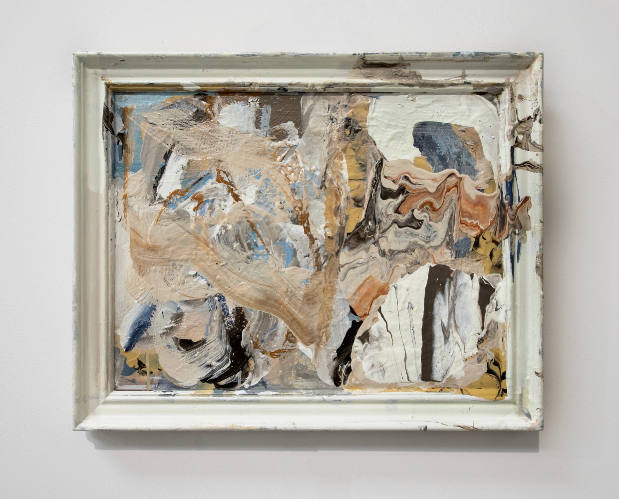 abstract painting with neutral colors in an off-white found frame.