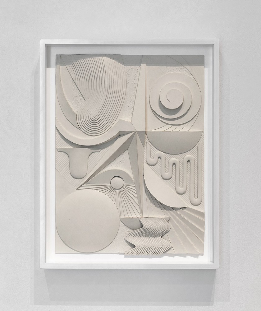 cream-colored monochromatic bas-relief with abstract geometric and organic forms