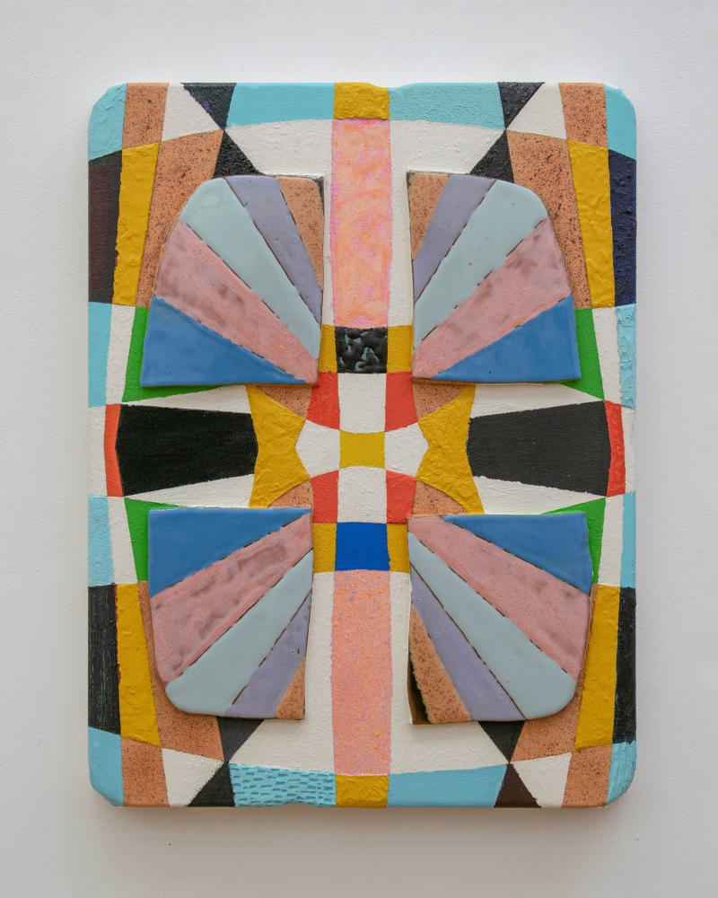 colorful painted canvas with fragments of glazed ceramics attached