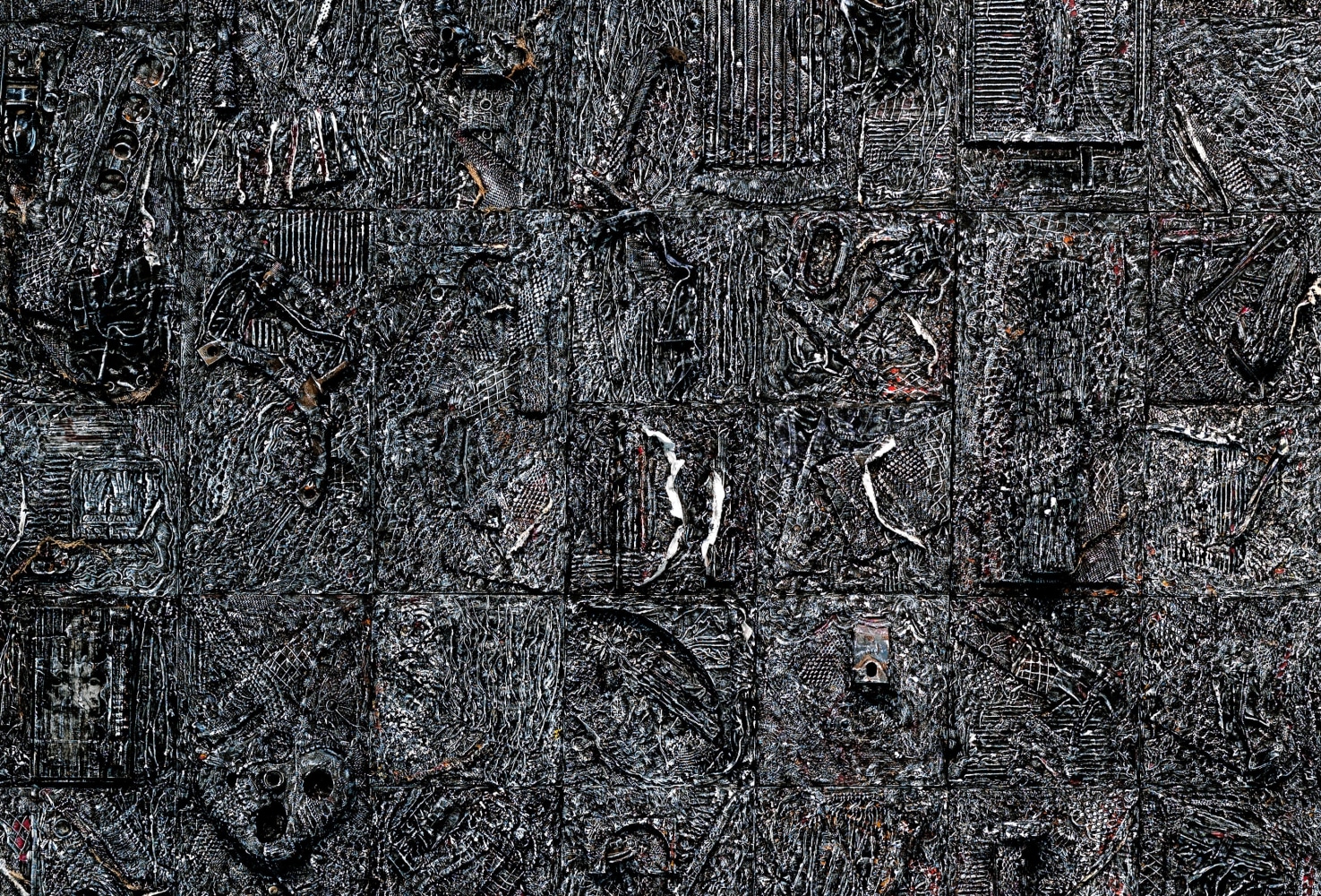 Close-up detail of black, textured artwork