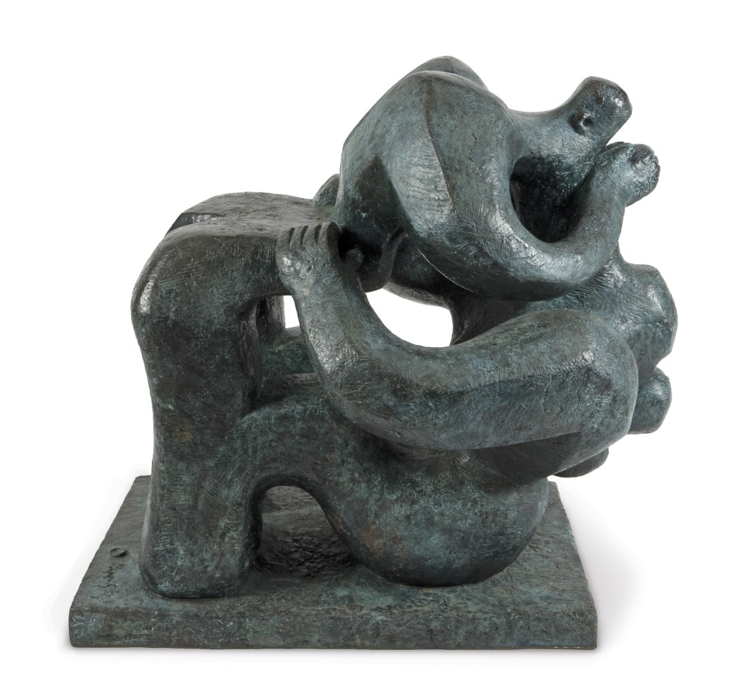 Bronze statue depicting two abstract figures embracing each other.