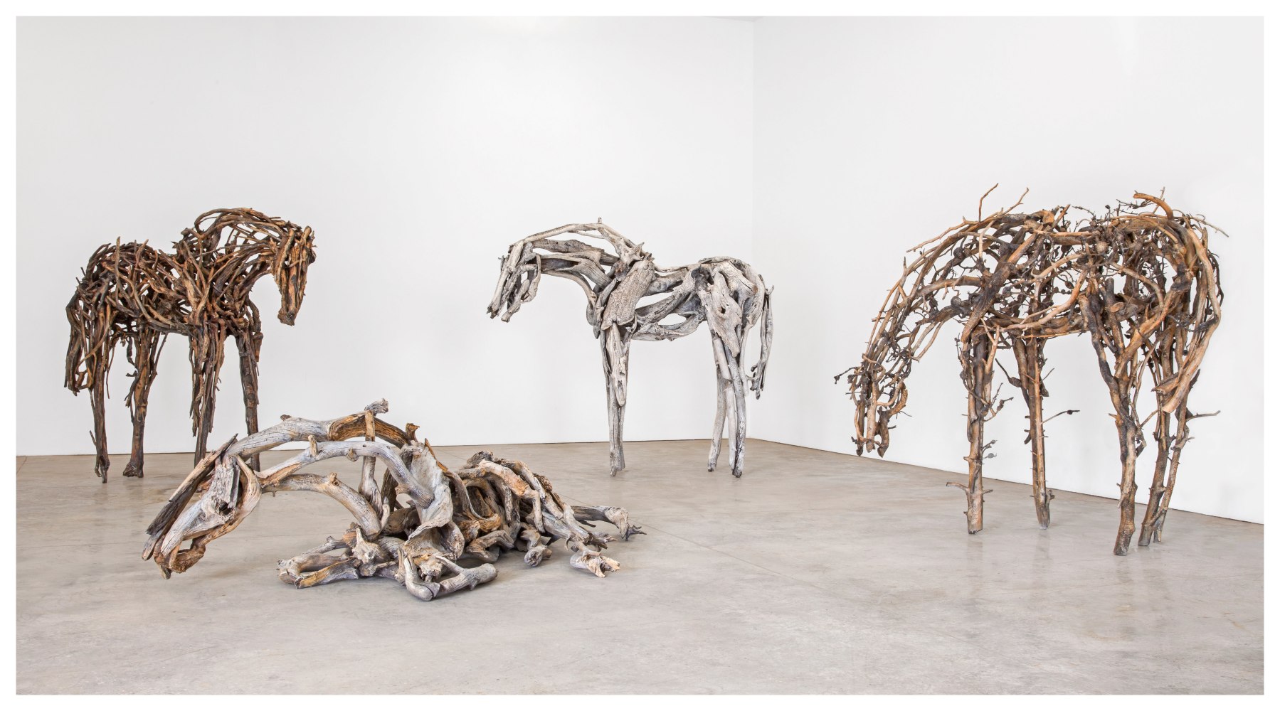 Installation view four horse sculptures by Deborah Butterfield