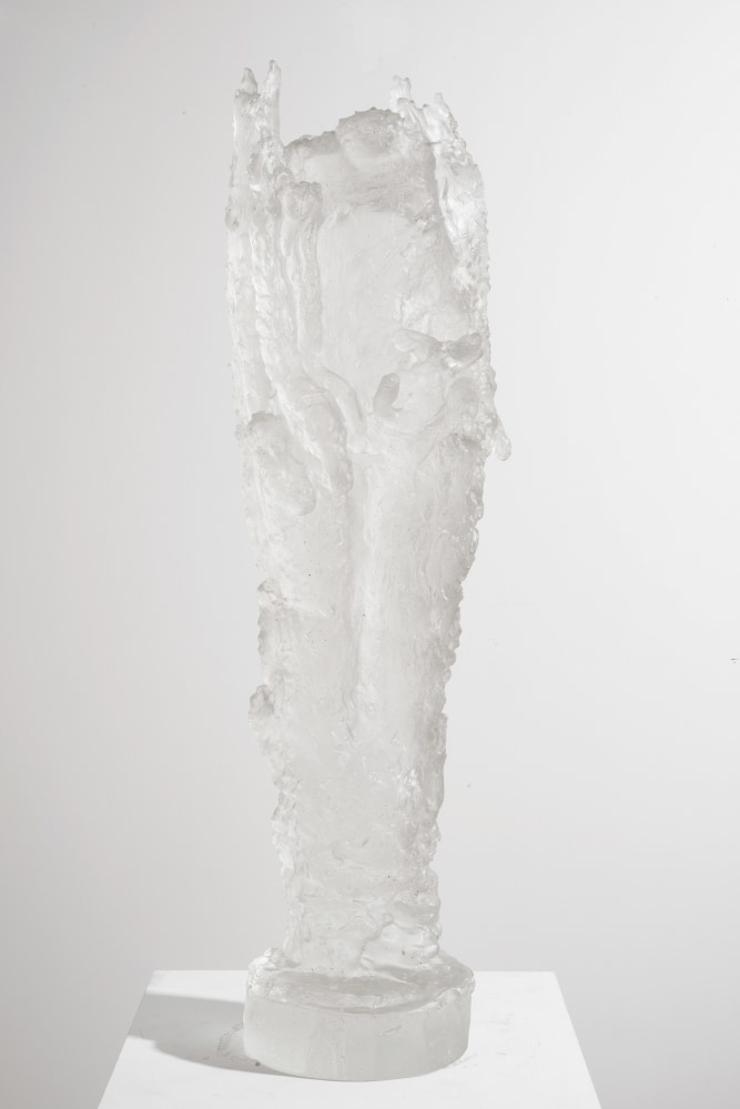Cylindrical cast glass sculpture with circular base by Michele Oka Doner.