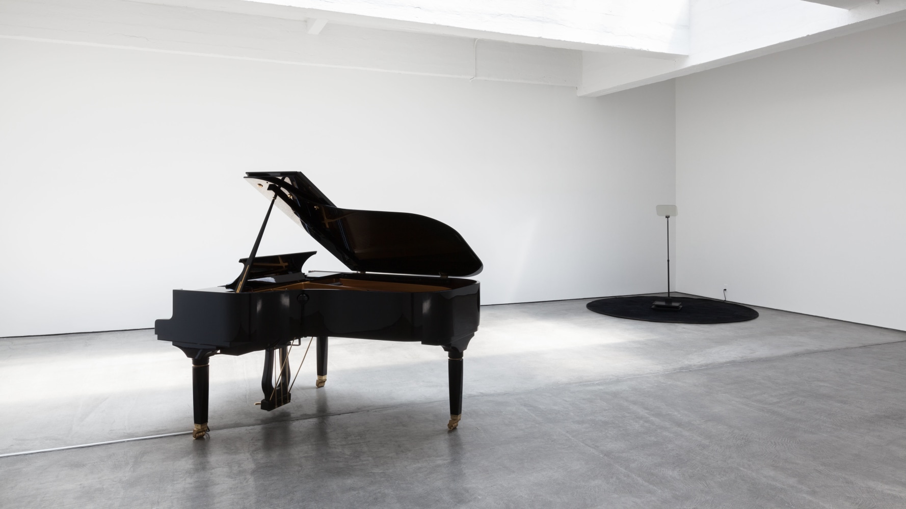 Céleste Boursier-Mougenot indexes, 2005/2011 Pleyel piano P190 with PianoDisc system, carpet, teleprompter, computer and software dimensions variable; piano: 74 1/2 x 59 1/2 x 40 1/2 in. (189.2 x 151.1 x 102.9 cm)