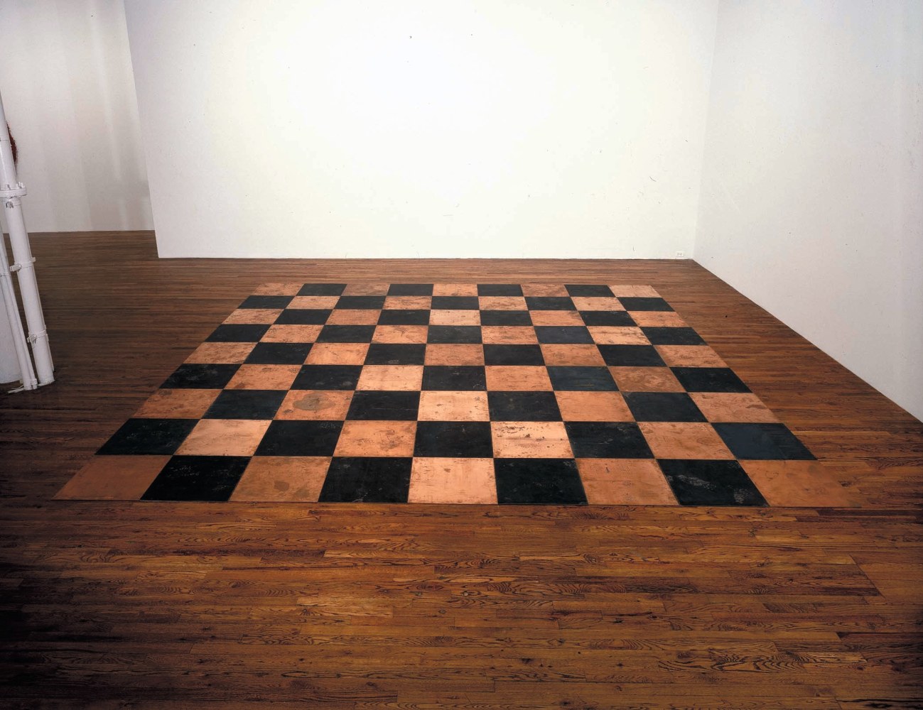 Carl Andre &quot;81 CuFe (The Net of Hephaestus)&quot; 1981 Copper and steel, 81 units Overall 3/16&quot; x 15' x 15'