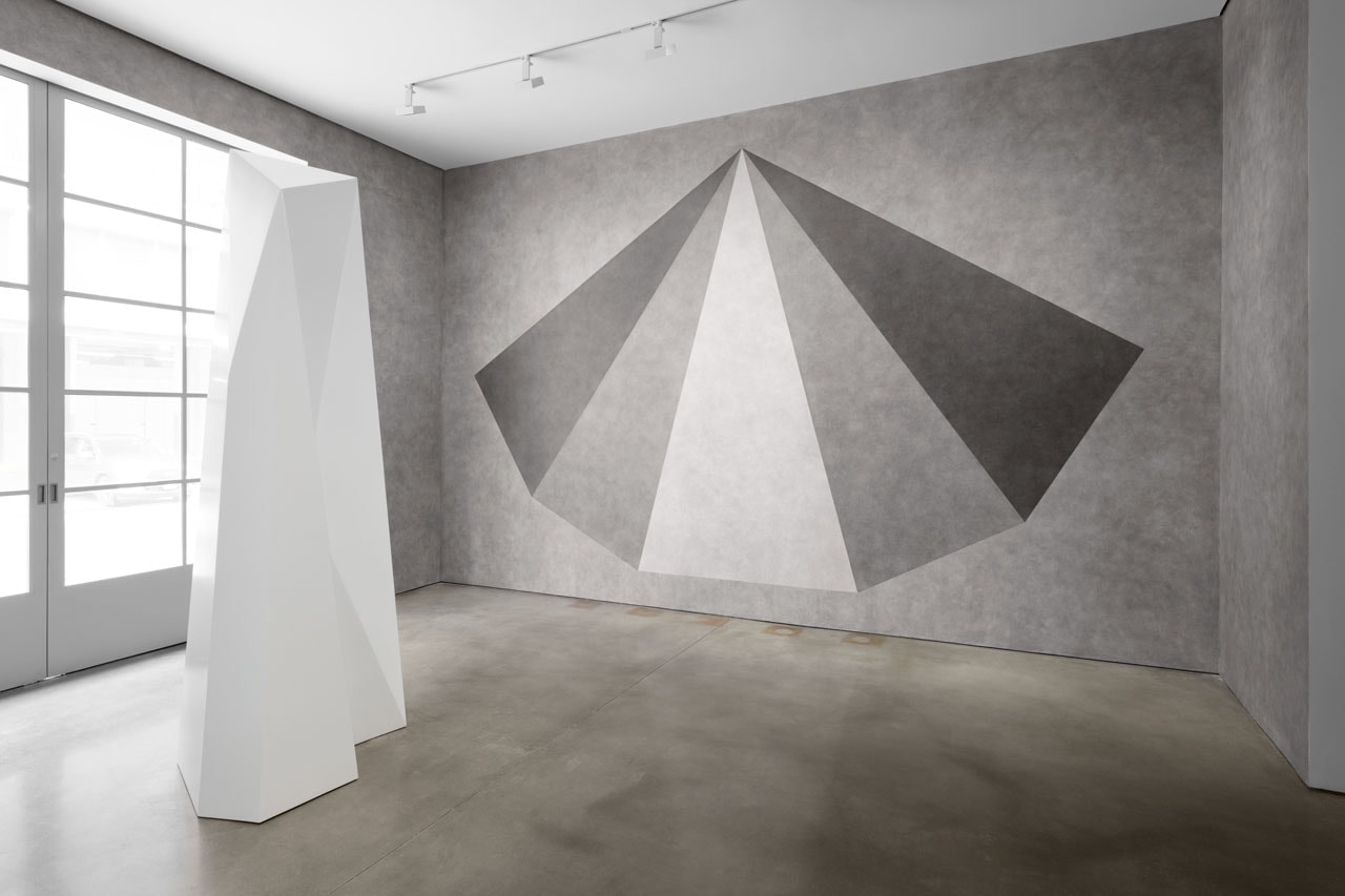 Sol LeWitt Wall Drawing #500 Symmetrical pyramid with gray ink washes superimposed, October 1986 India ink wash dimensions variable First drawn by: Douglas Geiger, David Higginbotham, Kazuko Miyamoto, Anthony Sansotta, Rebecca Schwab, Susanna Singer, Kei Tsujimura, Jo Watanabe First installation: Drawing Center, New York