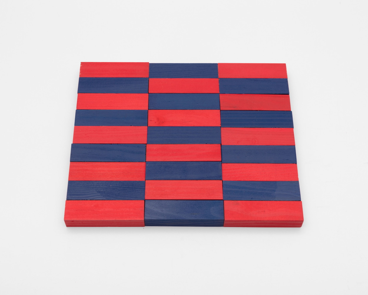 Carl Andre 27 Red/Blue Rectangle, New York, 2017 wood, 27 units  each: 5/8 x 3 1/16 x 7/8 in. (1.6 x 7.8 x 2.2 cm) overall: 5/8 x 7 3/4 x 9 1/8 in. (1.6 x 19.7 x 23.2 cm)