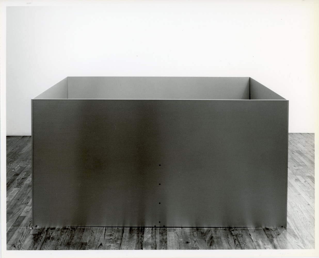 Donald Judd &quot;Untitled&quot; 1989 Clear anodized aluminum and orange plexiglass 39 3/8&quot; x 78 3/4&quot; x 78 3/4&quot;
