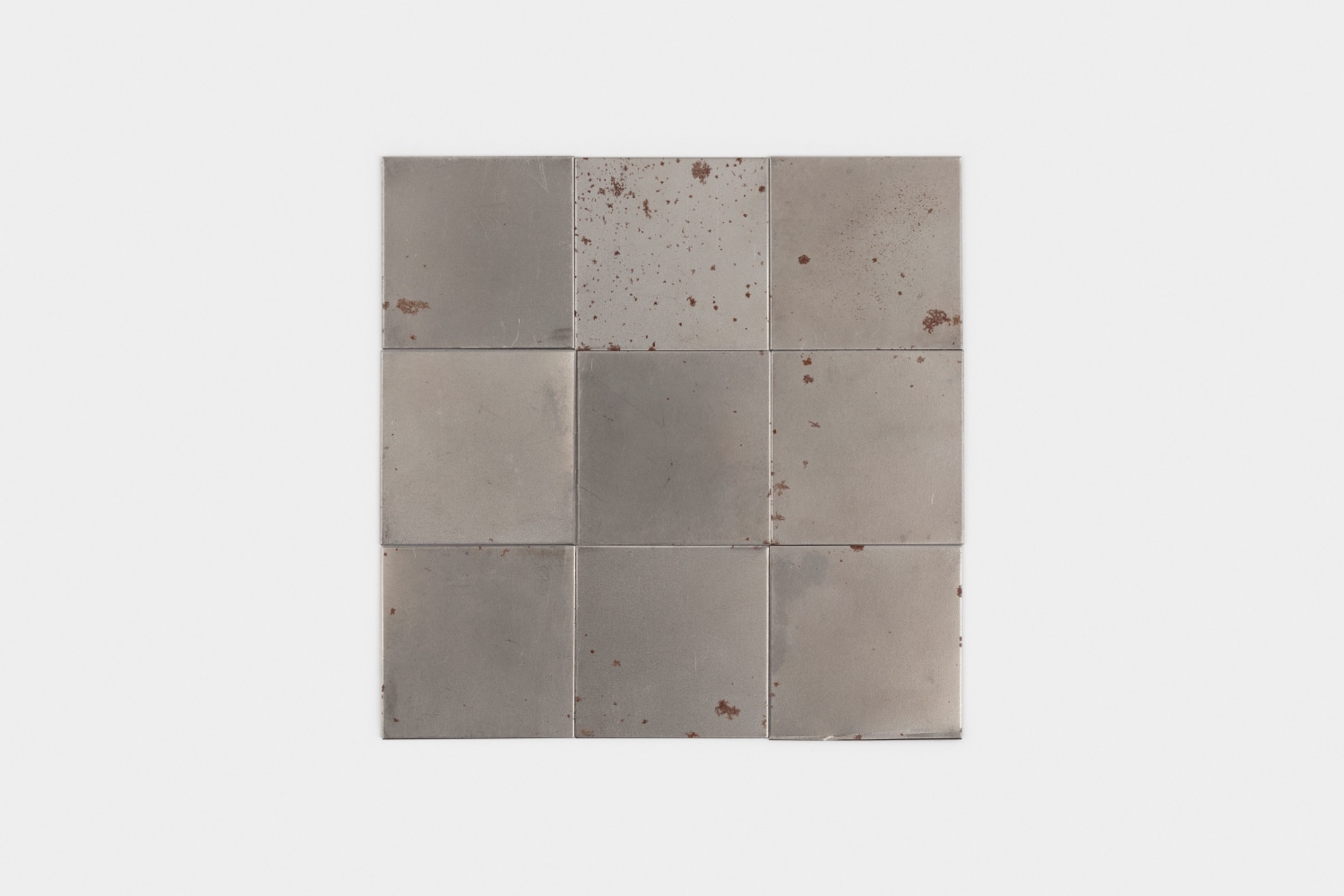 Carl Andre 3 Fe Squared, 2000 steel (9 unit square) each: 1/32 x 2 x 2 in. (.1 x 5.1 x 5.1 cm) overall: 1/32 x 6 x 6 in. (.1 x 15.2 x 15.2 cm)