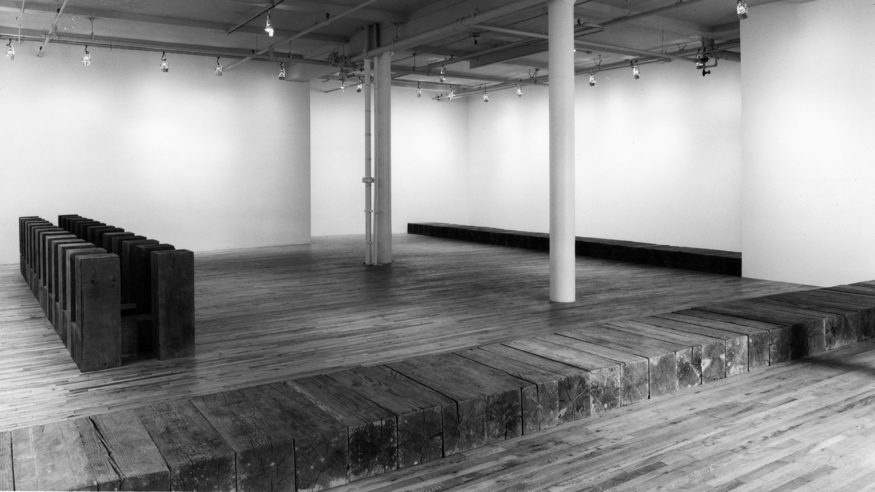 Installation view, Uncarved Blocks, 155 Wooster Street, New York, November 7 - December 5, 1981. © 2025 Carl Andre / Artists Rights Society (ARS), New York. Courtesy Paula Cooper Gallery, New York. Photo: Geoffrey Clements.