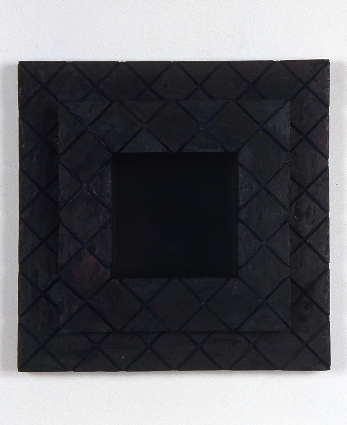 Jackie Winsor "Inset Wall Piece (2" diagonal cut blue & graphite grid)" 2000-2001  reddish black concrete 15 X 15 X 7 3/4 in. (35.56 X 35.56 X 19.69 cm)  inset in wall 4" deep