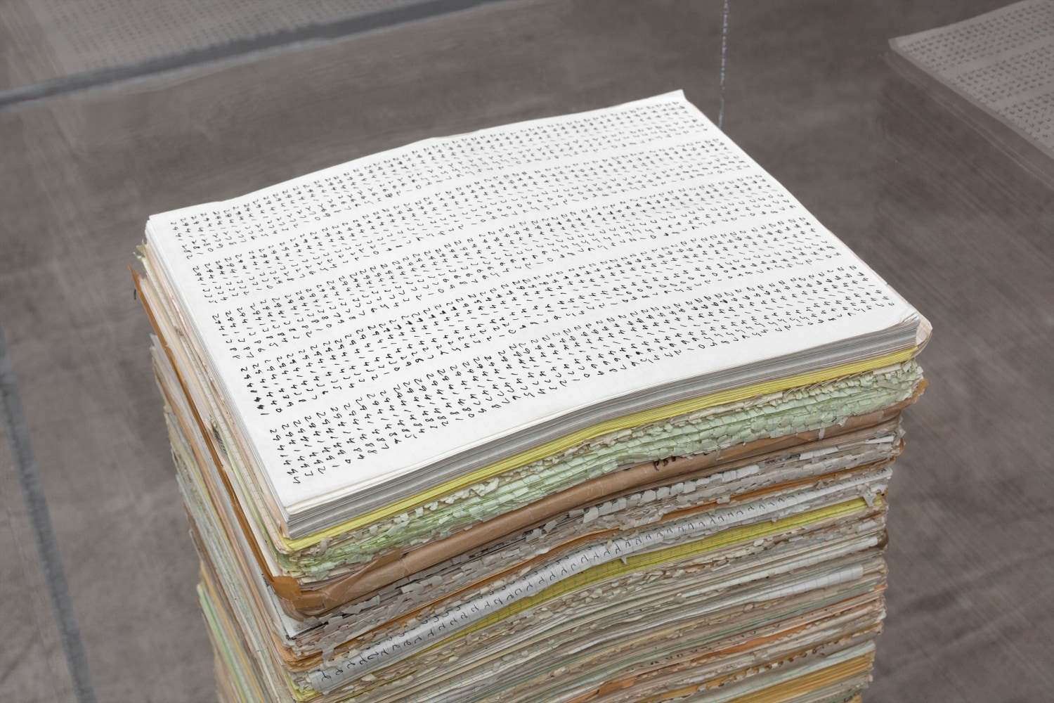 Counting from 1 to 2,941,494, (detail), 1969 stack of numbered ink and/or pencil on paper each sheet: 8 1/2 x 11 in. (21.6 x 27.9 cm) unknown number of sheets, approximately 37 in. high (94 cm) in vitrine: 49 1/4 x 17 1/2 x 14 1/2 in. (125.1 x 44.5 x 36.8 cm)