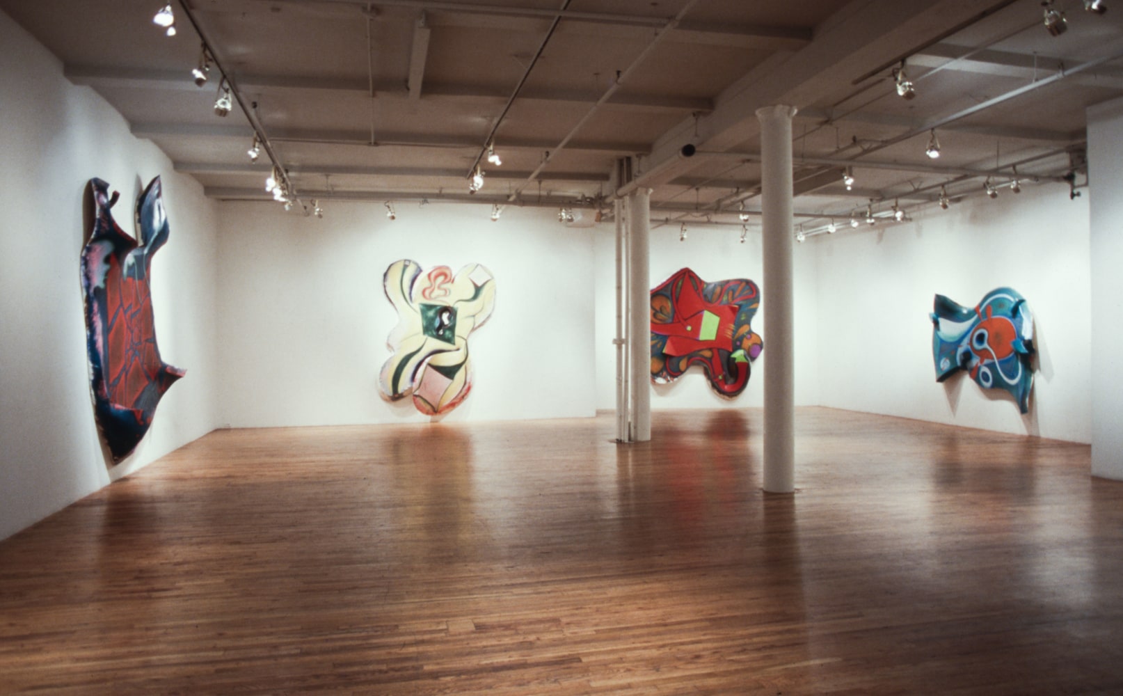 Installation view, Paintings and Drawings, Paula Cooper Gallery, 155 Wooster Street, New York, April 25 - May 23, 1987. © 2025 Elizabeth Murray / Artists Rights Society (ARS), New York. Courtesy Paula Cooper Gallery, New York. Photo: Geoffrey Clements.