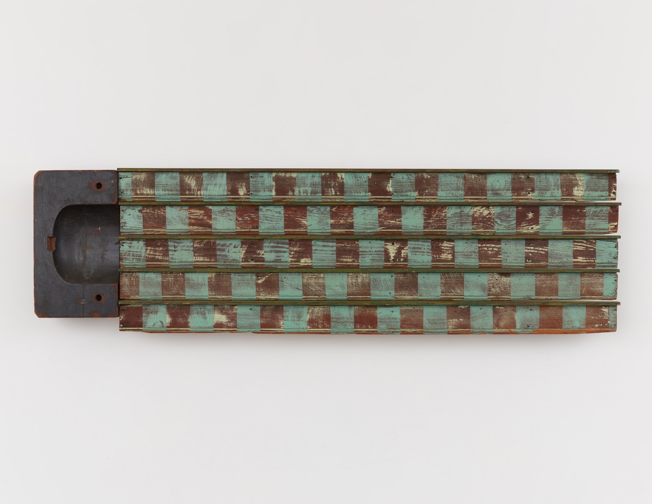 Terry Adkins, Jupiter, 1994, wood and enamel, 13 1/2 x 48 in. (34.3 x 121.9 cm)