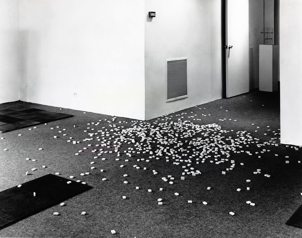 Carl Andre &quot;Scatter&quot; 1966 33 ball bearings, 13 pulley discs, 9 pieces aluminum channel, 14 plexiglas rectangular solids, 7 aluminum ingots Overall 21'6&quot; x 22'1 1/2&quot;