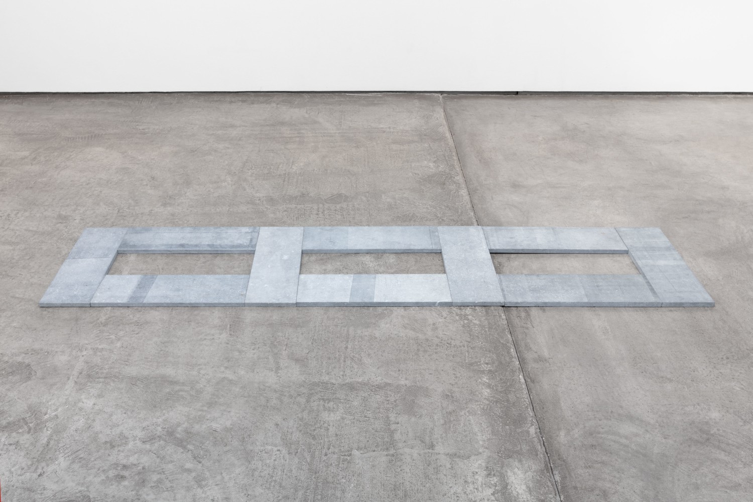 Carl Andre Limestone Tricel, 2009 10 unit Belgian blue limestone rectangle each: 1 x 23 1/2 x 7 7/8 in. (2.5 x 60 x 20 cm) overall: 1 x 23 1/2 x 102 3/8 in. (2.5 x 60 x 260 cm)