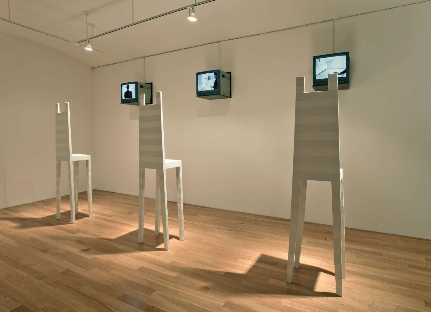 Robert Wilson Deafman Glance: A Video Installation, 1991 video, 6 television monitors with metal shelves, wood chairs and enamel paint, 6 chairs 81 x 20 3/4 x 14 3/4 inches (205.7 x 52.7 x 37.5 cm) each video running time: 26:53 minutes ​Edition of 1, 1 AP