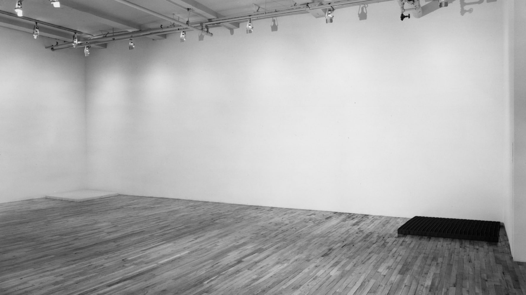 Installation view, Carl Andre, Paula Cooper Gallery, 155 Wooster Street, New York, March 1 - 26, 1983. Photo: Geoffrey Clements.