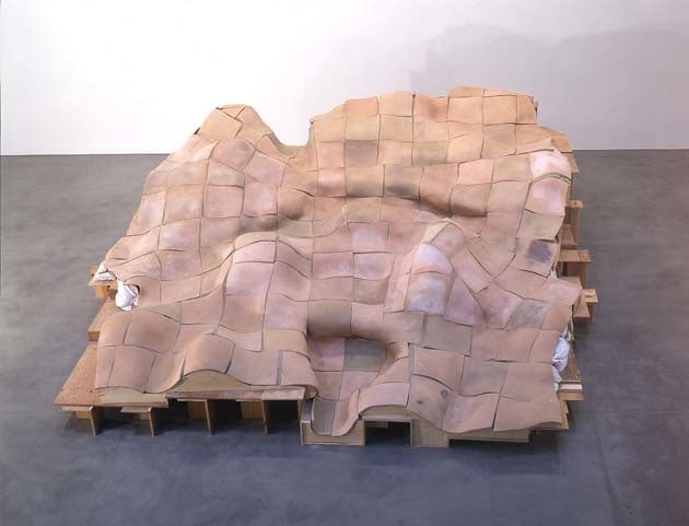 Meg Webster "Warped Floor" 2000 Fired clay plates over wood and sand 6' x 22' x 20'