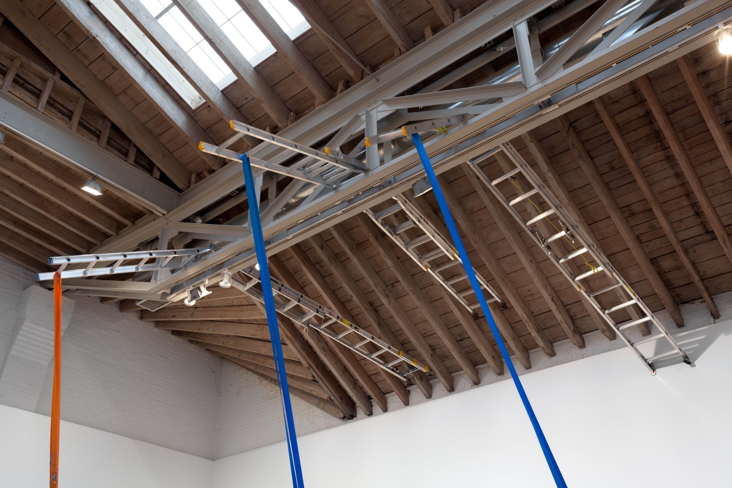 Matias Faldbakken Ladder Pull #2, (detail), 2014 concrete barriers, aluminum ladders, nylon ratchet straps, canvas and leather sling straps 312 x 381 x 221 in. (792.5 x 967.7 x 561.3 cm) 26 ft x 31 ft 9 in. x 18 ft 5 in. (792.5 x 967.7 x 561.3 cm)