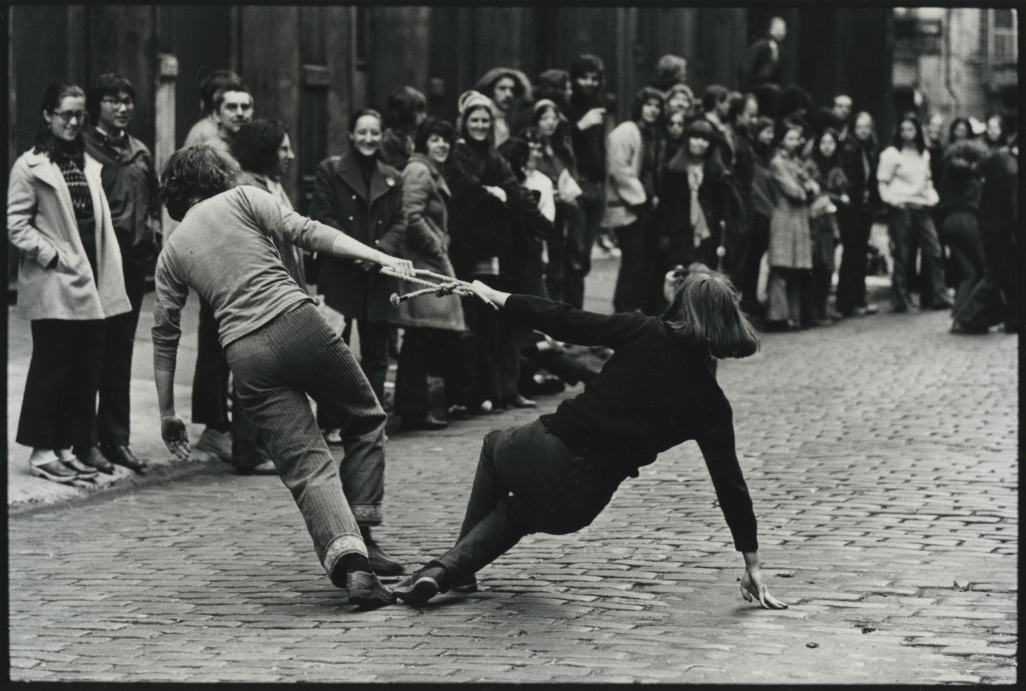 Trisha Brown and Carol Goodden performing Trisha Brown's "Leaning Duet", Wooster st., 1970, 1970 gelatin silver print