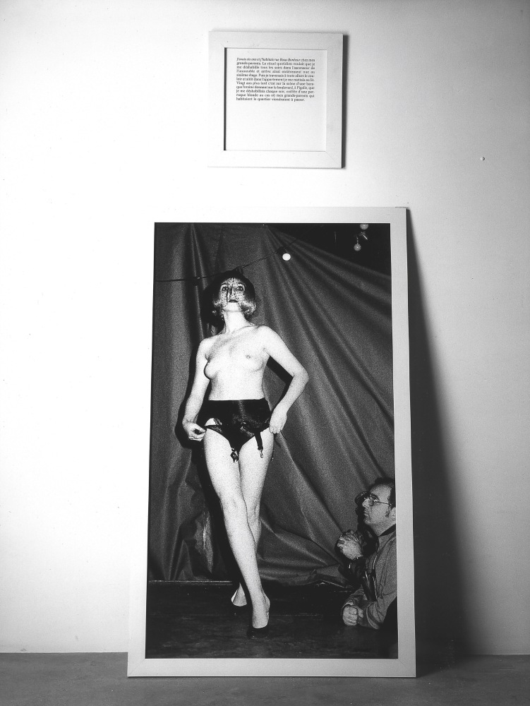 Sophie Calle "The Striptease" 1989 Black & white photograph with text panel photograph: 67 3/8 x 39 3/8" text panel: 19 5/8 x 19 5/8"