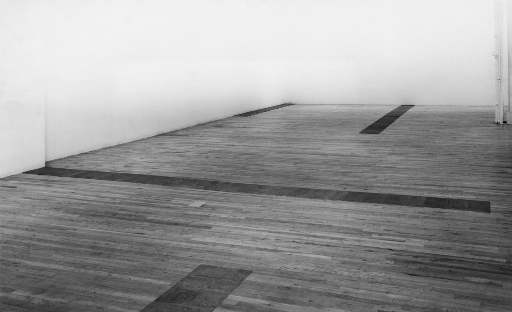 Installation view, Carl Andre, Paula Cooper Gallery, 155 Wooster Street, New York, January 5 - 30, 1985. © 2025 Carl Andre / Artists Rights Society (ARS), New York. Courtesy Paula Cooper Gallery, New York. Photo: Geoffrey Clements.