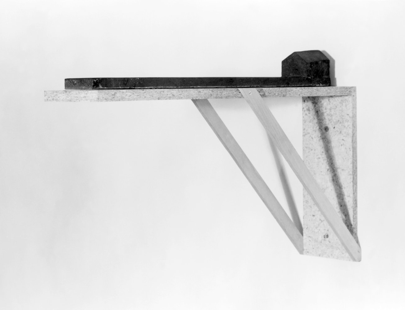 Joel Shapiro Untitled, 1973-74 cast iron and chipboard house: 3 x 27 1/4 x 2 5/8 inches (7.6 x 69.2 x 6.7 cm) shelf: 14 3/4 x 29 3/4 x 5 inches (37.5 x 75.6 x 12.7 cm) overall: 17 3/4 x 29 3/4 x 2 5/8 inches (45.1 x 75.6 x 6.7 cm)