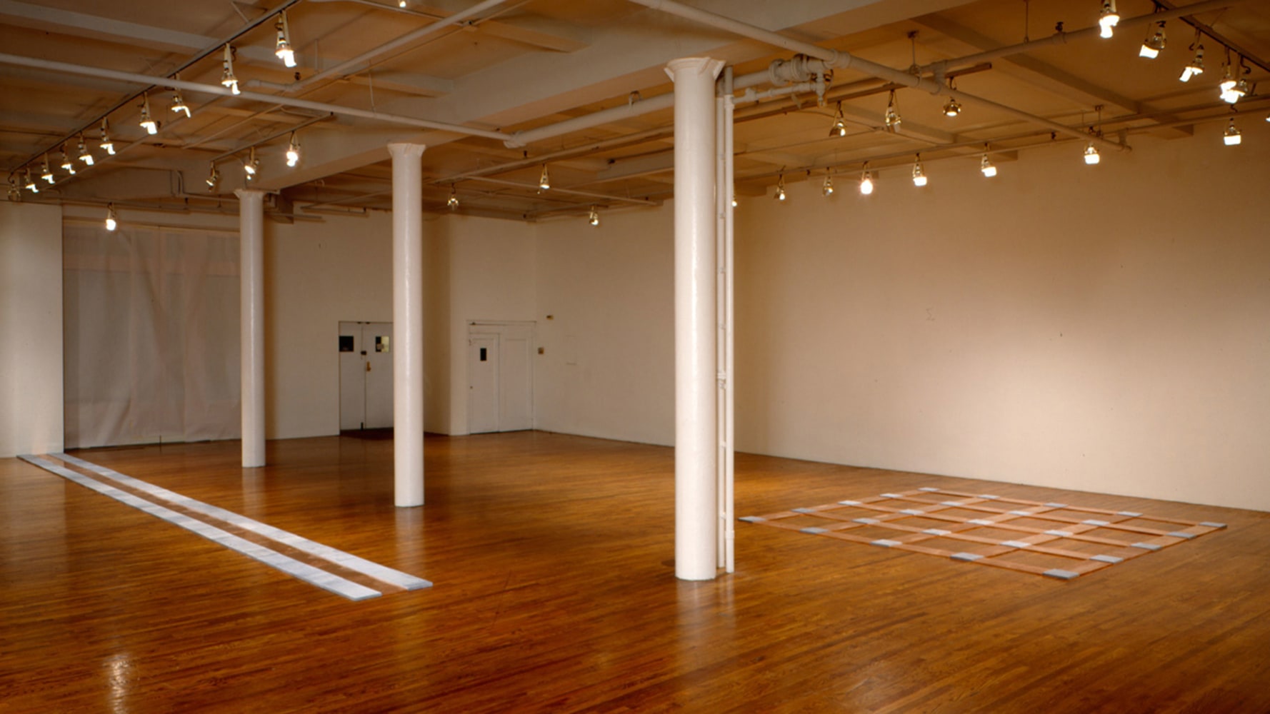 Installation view, Carl Andre, Paula Cooper Gallery, 155 Wooster Street, New York, October 4 - 31, 1990. © 2025 Carl Andre / Artists Rights Society (ARS), New York. Courtesy Paula Cooper Gallery, New York. Photo: Scott Bowron.