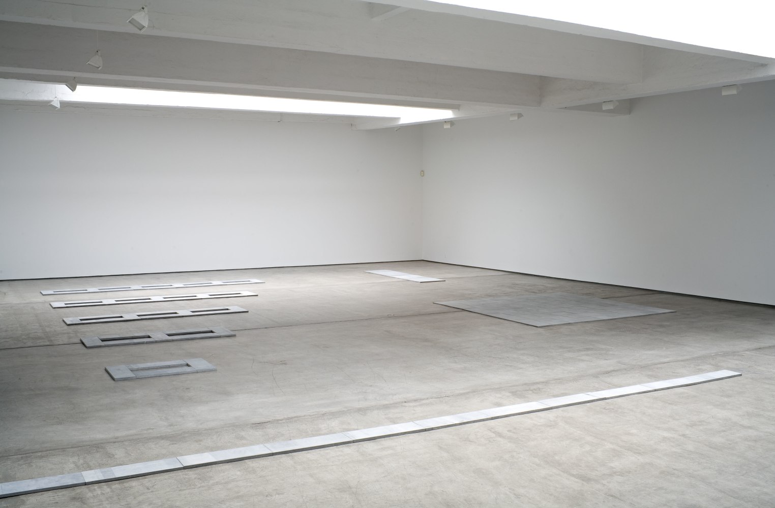 Installation view, Carl Andre, Paula Cooper Gallery, 521 West 21st Street, New York. September 26 - October 24, 2009. © 2025 Carl Andre / Artists Rights Society (ARS), New York. Courtesy Paula Cooper Gallery, New York.
