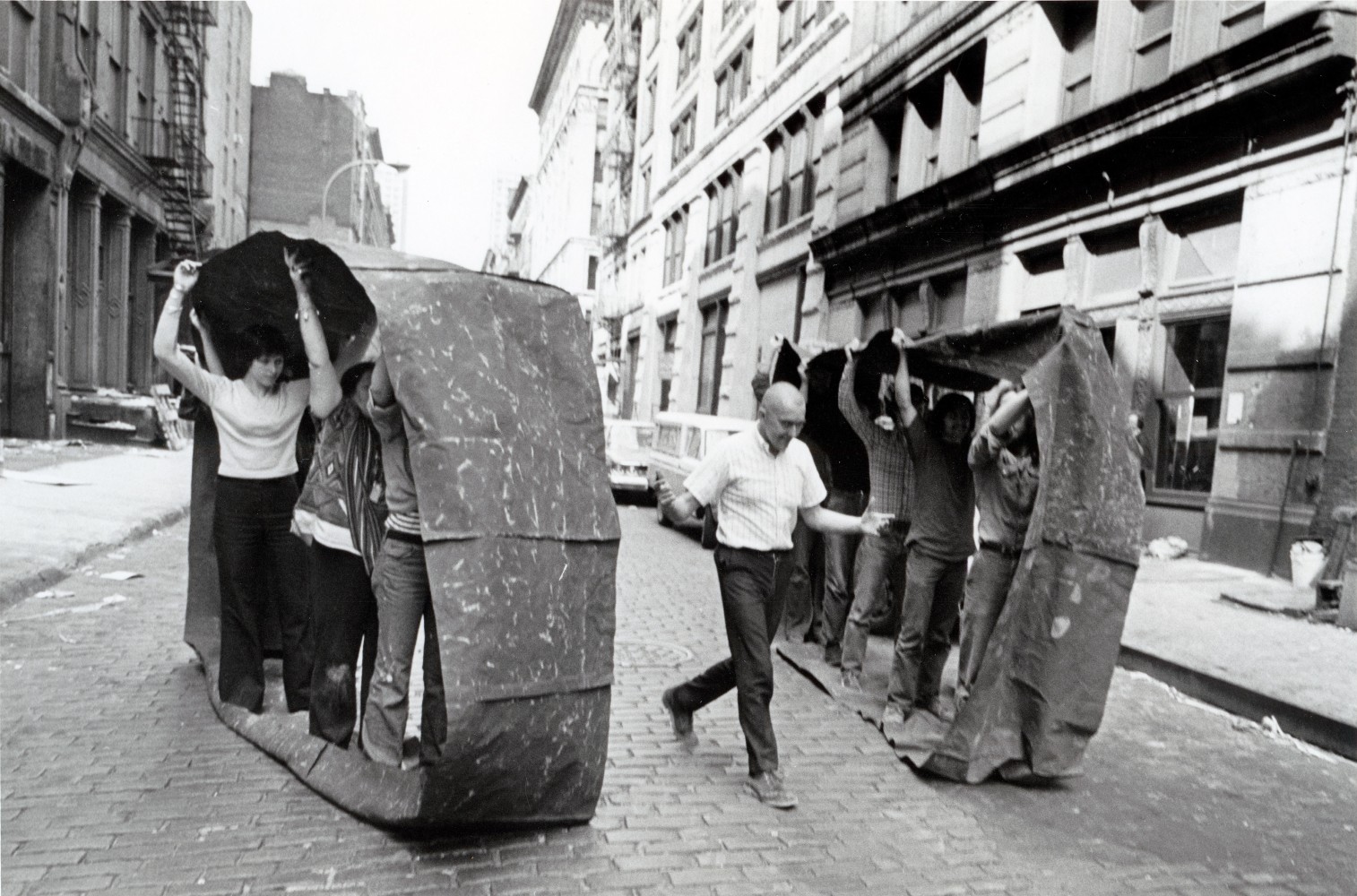 Peter Moore, George Maciunas refereeing "Team Canvas Loop Run" by Robert Watts, Flux Game Fest, Wooster Street, NY, May 19, 1973 gelatin silver print image: 6 x 9 in. (15.2 x 22.9 cm)