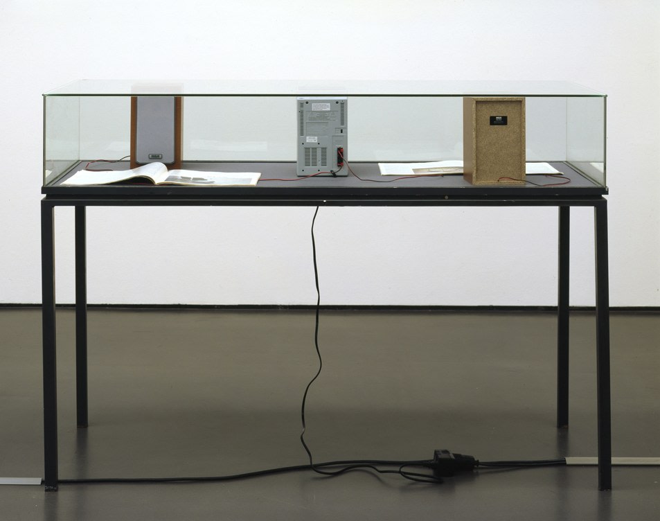 Sam Durant "Recursion" 2003 Vitrine, magazines, CD player 41.5 x 59 x 23.5 in.