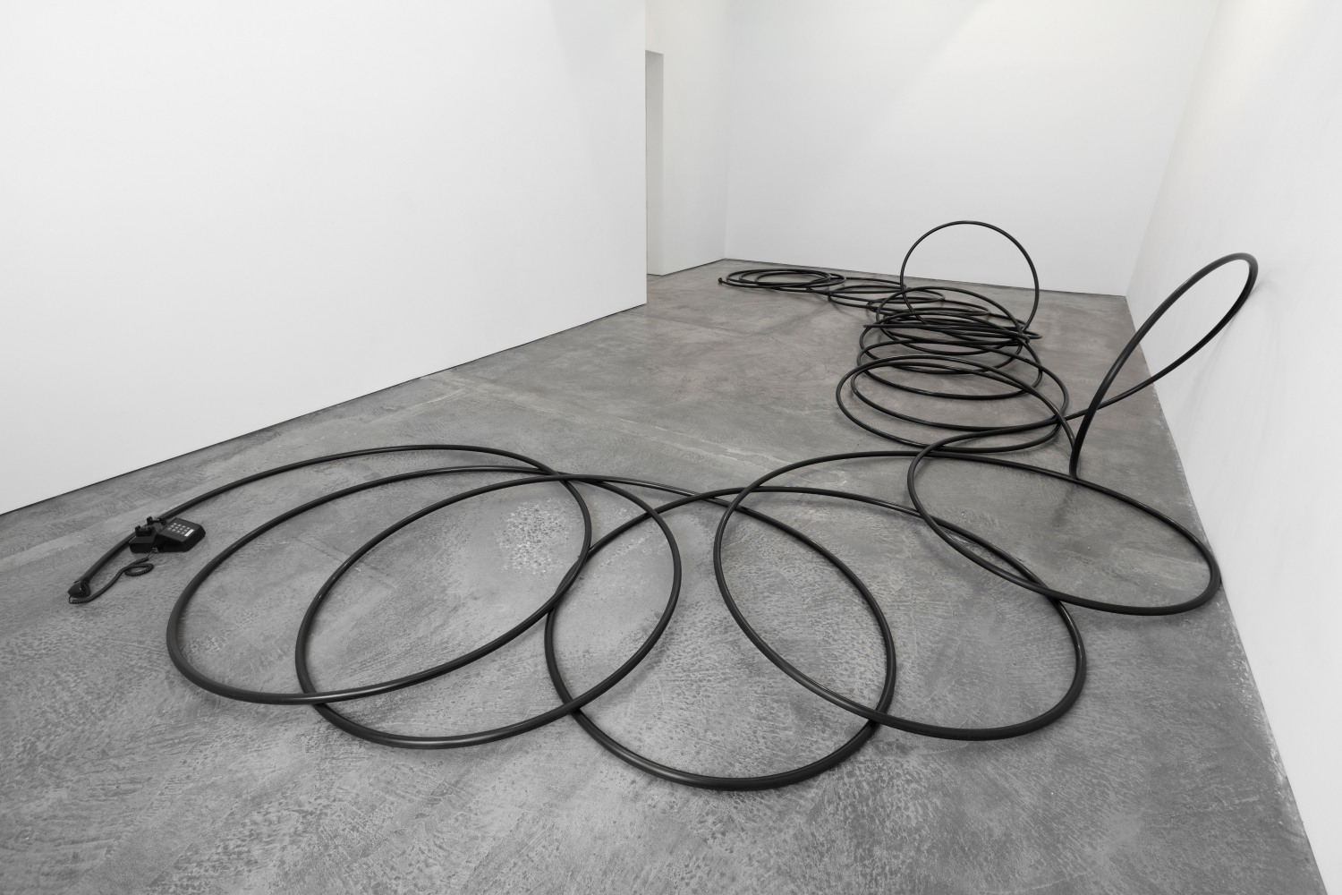 Christian Marclay
Extended Phone II, 1994
telephone and plastic tubing
dimensions variable