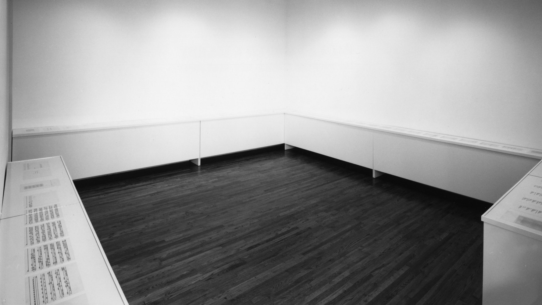 Installation view, Words as Poems, Matter as Sculpture, Paula Cooper Gallery, 155 Wooster Street, New York, April 8 - 29, 1989. © 2025 Carl Andre / Artists Rights Society (ARS), New York. Courtesy Paula Cooper Gallery, New York. Photo: Geoffrey Clements.