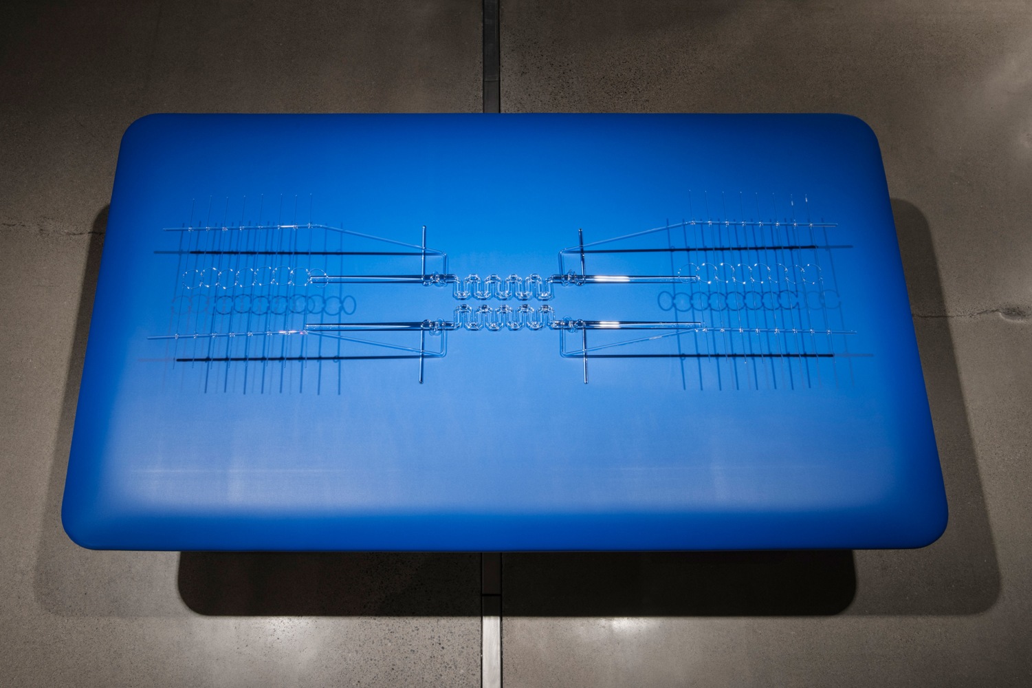 Tauba Auerbach
Where there had once been a snag in the fabric, 2018
Borosilicate glass on cushioned physical therapy table
sculpture: 6 3/4 x 18  x 66 1/2 in. (17.1 x 45.7 x 168.9 cm)
base: 86 x 33 1/4 x 48 in. (218.4 x 84.5 x 121.9 cm)
