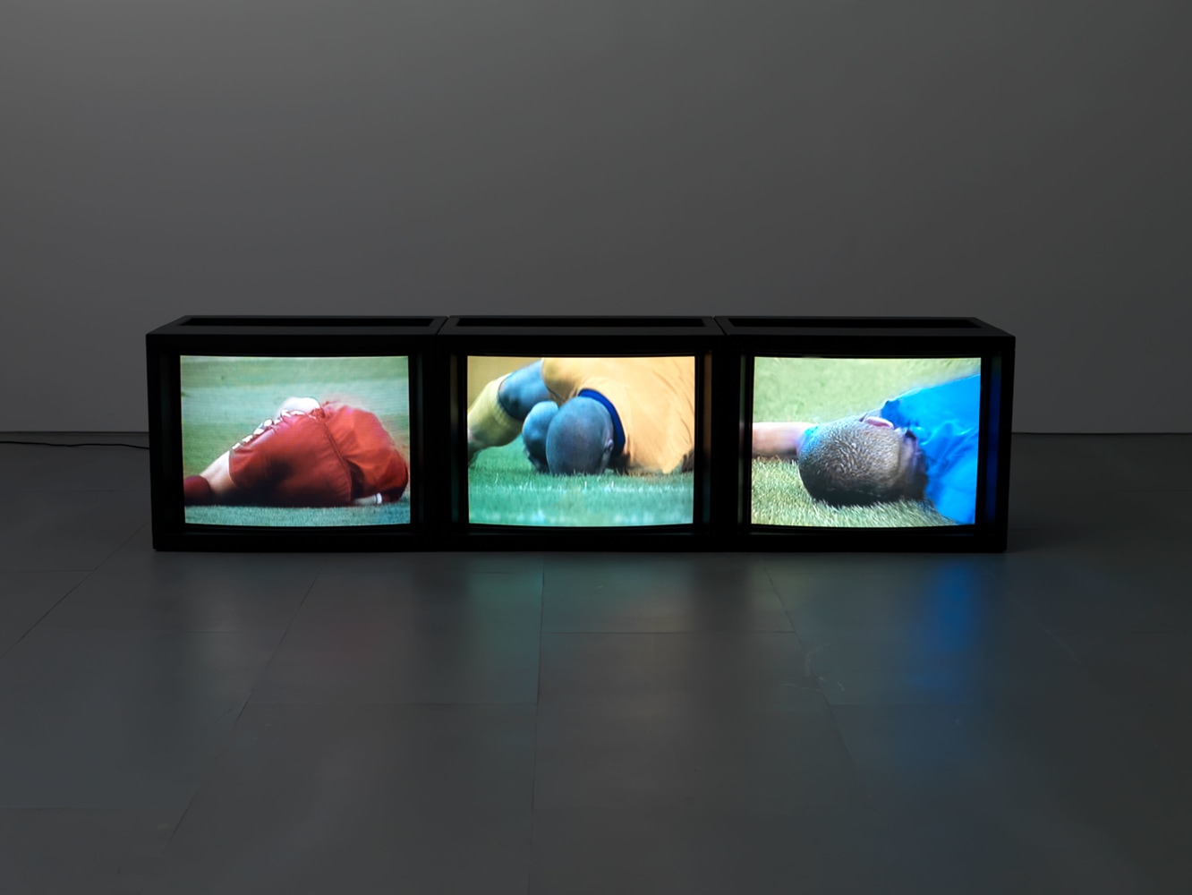 Paul Pfeiffer, Caryatid, 2008; three channel digital video loop, three custom 32 inch monitors with embedded media players; overall: 21 x 25 x 96 in. (243.8 x 53.3 x 63.5 cm); running time: 45 seconds each loop (synched); Edition of 3, 2AP