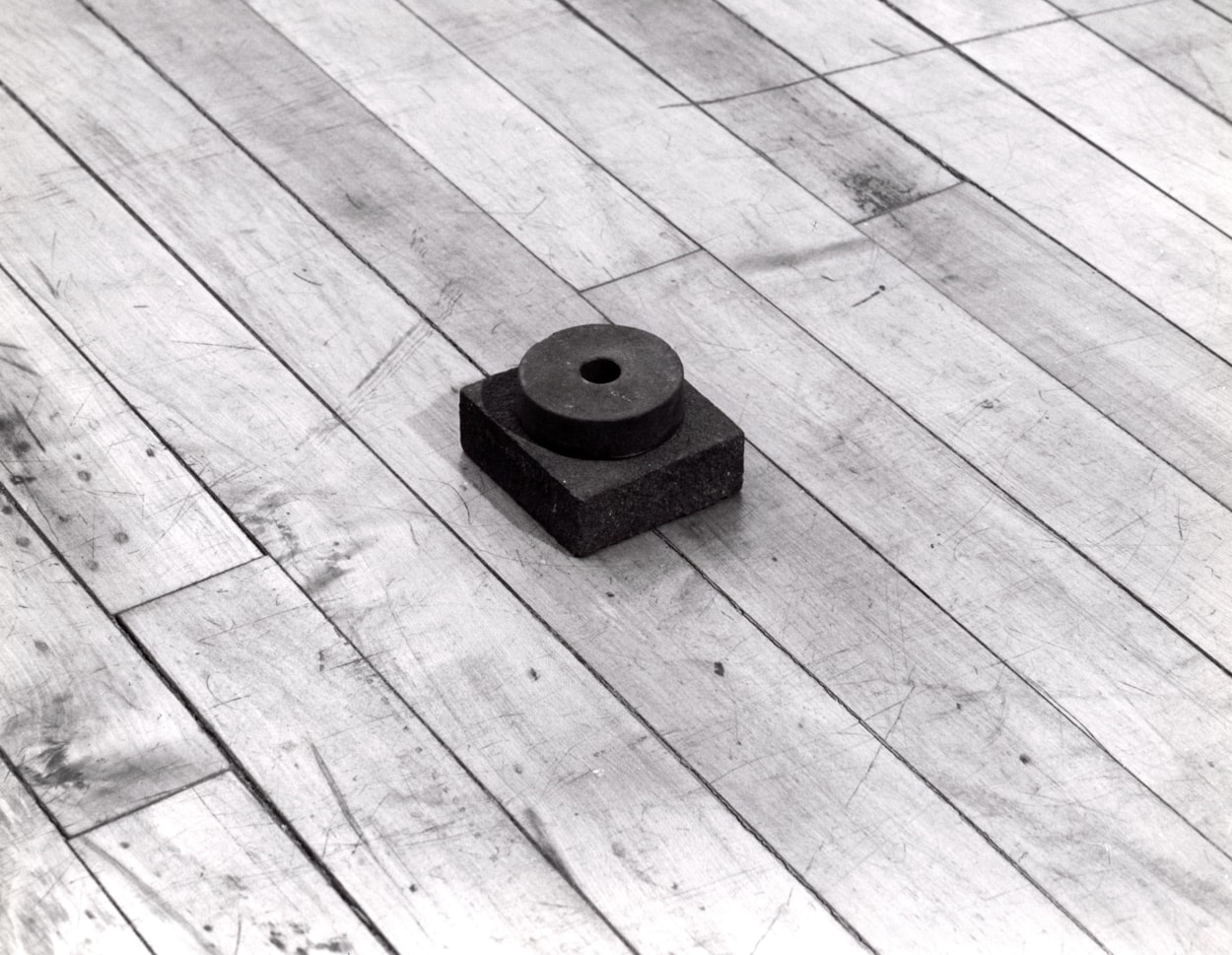 Carl Andre "Navel" 1988 Steel block and steel ring 1 3/4" x 2 3/4" x 3"